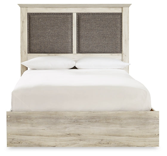 Cambeck King Upholstered Panel Bed with Mirrored Dresser, Chest and Nightstand